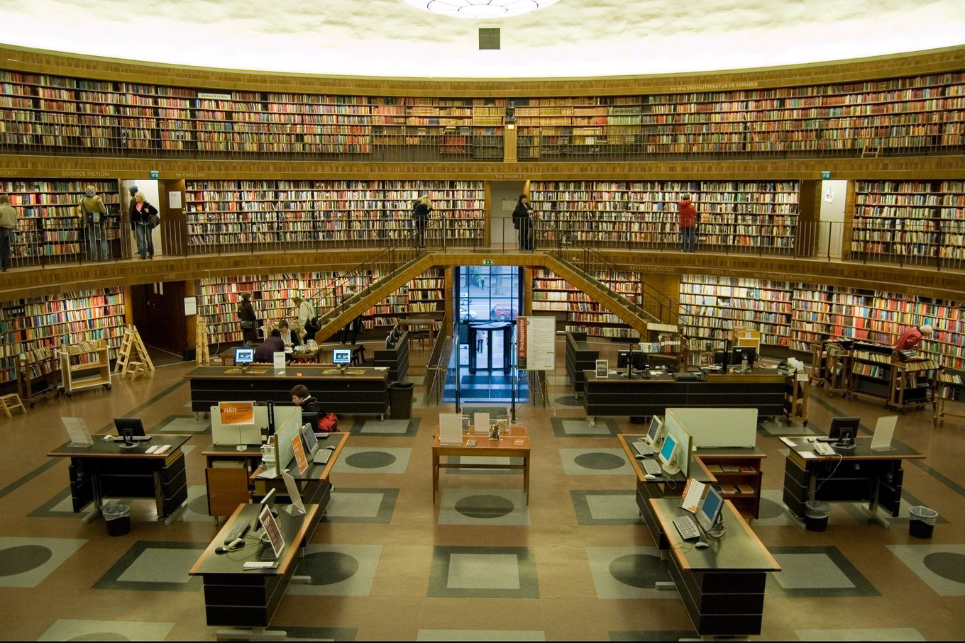 The round reading room of Stockholm Public Library, shelves of books rising on every side